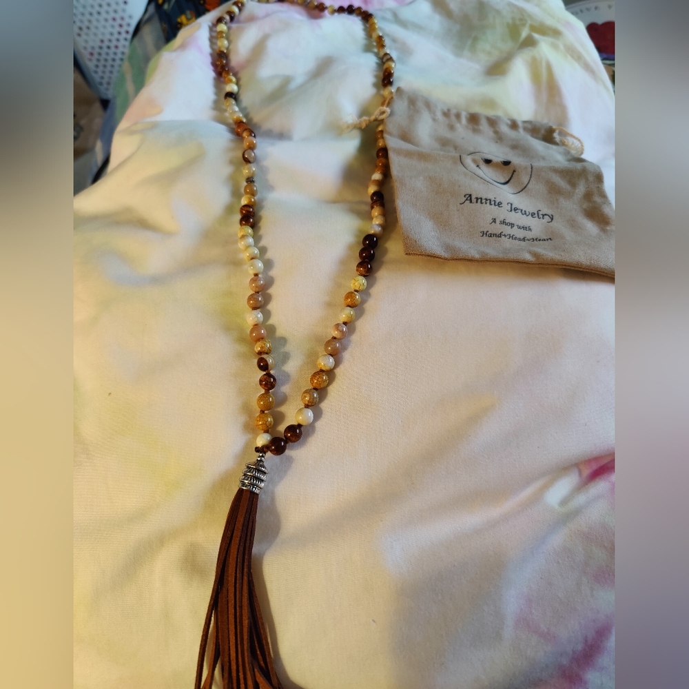 New in bag Annie's jewelry stone necklace with leather tassel